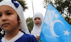 Doğu Türkistan'da başörtüsü yasağı kameralara yansıdı