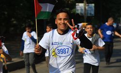 Iraklı yetim çocuklar, Bağdat'ta “Gazze için” koştu