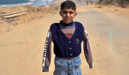 İsrail'in saldırıları sonucu kollarını kaybeden çocuk: "Yemek yemek ve yazmak istiyorum"