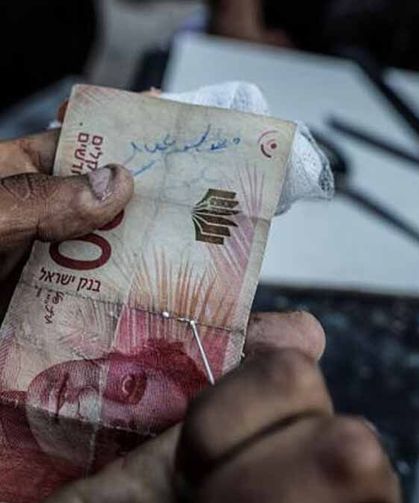 Gazze'de nakit krizi: Yıpranan paralar tamir ediliyor