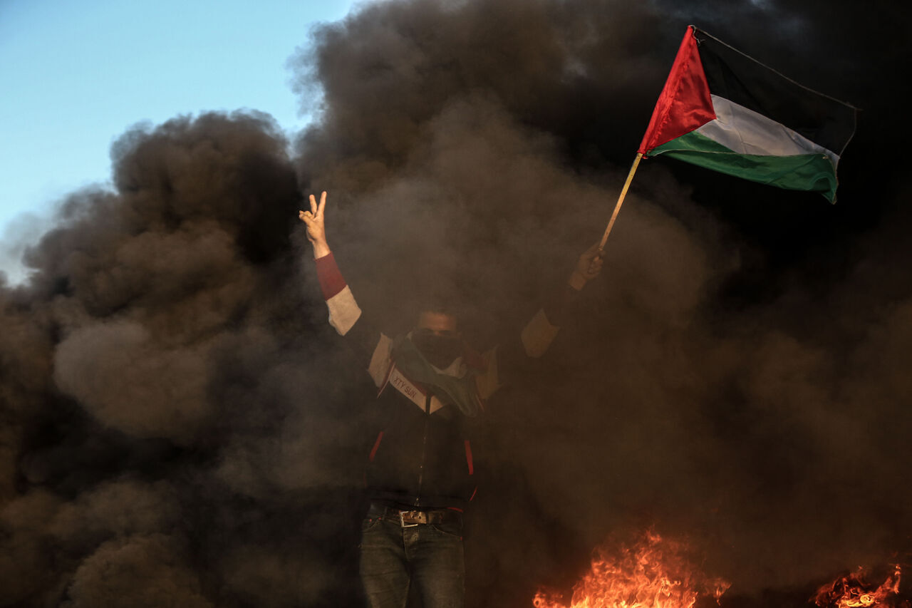 AA-20230126-30096305-30096290-ISRAIL_GUCLERININ_CENINDE_9_FILISTINLIYI_OLDURMESI_GAZZEDE_PROTESTO_EDILDI
