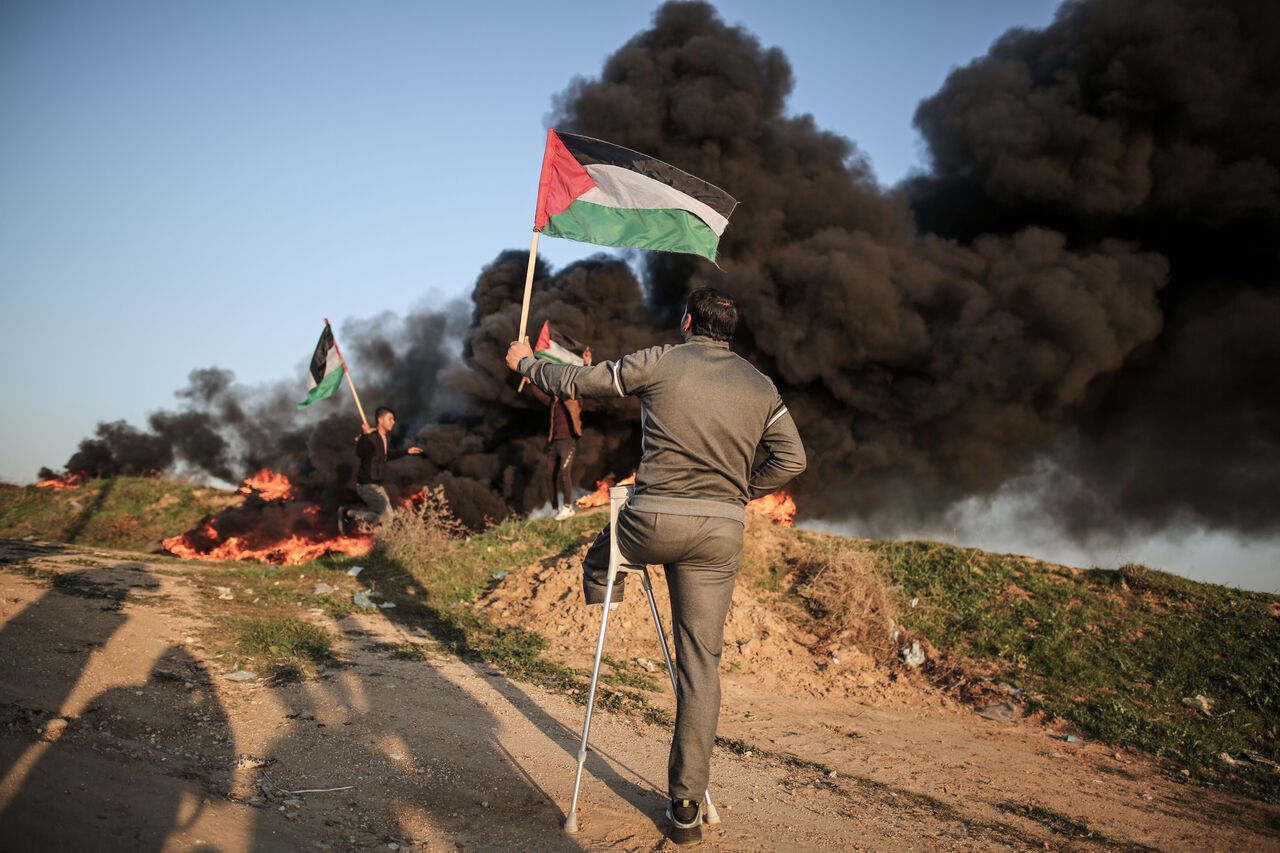 AA-20230126-30096305-30096292-ISRAIL_GUCLERININ_CENINDE_9_FILISTINLIYI_OLDURMESI_GAZZEDE_PROTESTO_EDILDI