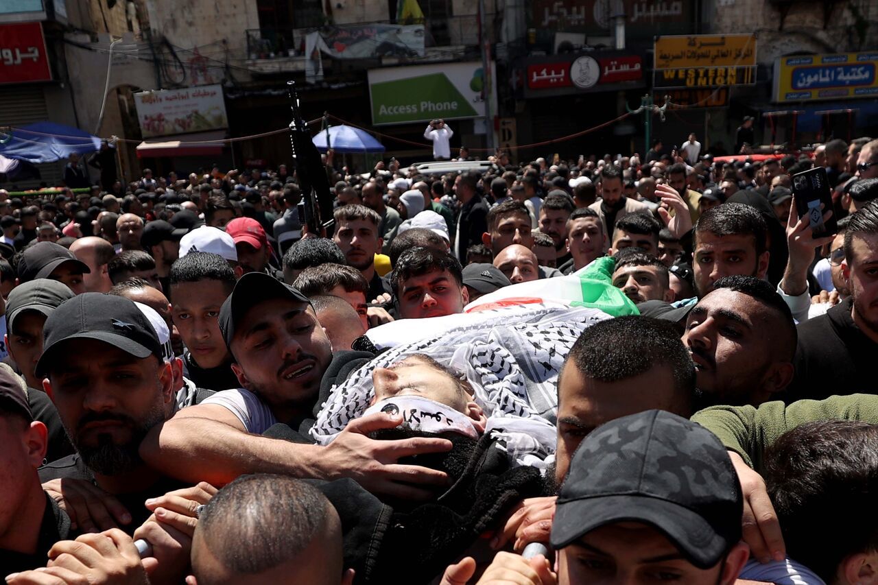 AA-20230403-30753508-30753506-ISRAIL_GUCLERINCE_BATI_SERIADA_OLDURULEN_FILISTINLININ_CENAZE_TORENI