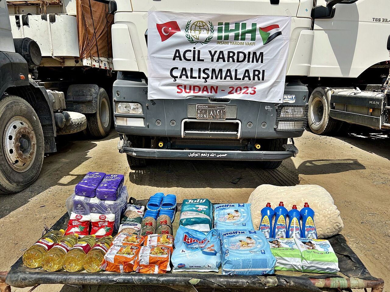 AA-20230816-31931445-31931443-IC_SAVASIN_SURDUGU_SUDANA_IHH_TARAFINDAN_15_KONTEYNERLIK_YARDIM_MALZEMESI_ULASTIRILDI